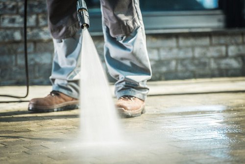 Suffolk patio mid-jet wash showing dramatic clean strip
